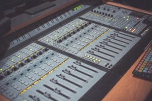 A mixing console in a recording studio as a symbol of AI-driven music production